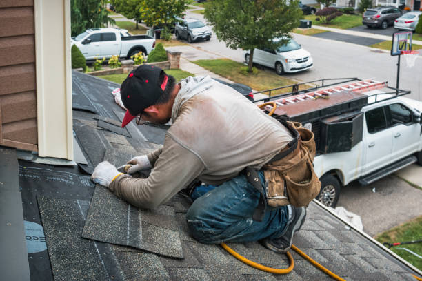 Professional Roofing technician working in Bally, PA